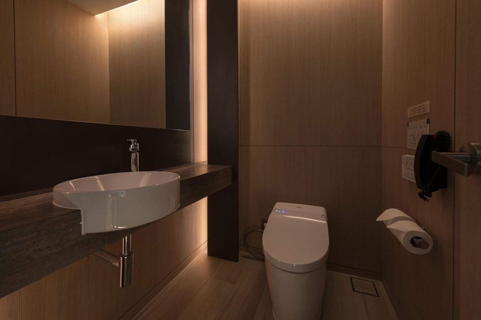 Mu Jiaoxi Hotel Eksteriør bilde A modern bathroom